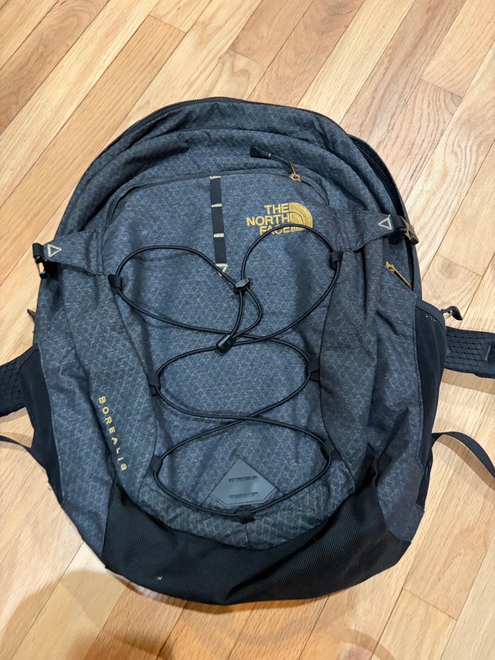 The North Face Borealis Backpack in Charcoal with Gold Accents